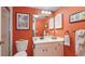 Bathroom with white vanity, coral accents, and walk-in shower at 307 Timberlake Dr # 307, Bradenton, FL 34210