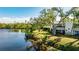 Waterfront condo building with lush landscaping at 307 Timberlake Dr # 307, Bradenton, FL 34210