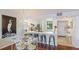 Bright, updated kitchen with white cabinets and eat-in area at 307 Timberlake Dr # 307, Bradenton, FL 34210