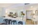 Modern kitchen featuring white cabinetry, stainless steel appliances and breakfast bar at 307 Timberlake Dr # 307, Bradenton, FL 34210