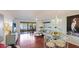 Bright and airy living room with hardwood floors, lake view and access to patio at 307 Timberlake Dr # 307, Bradenton, FL 34210