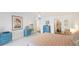 Main bedroom features a king bed, dresser, and access to a bathroom at 307 Timberlake Dr # 307, Bradenton, FL 34210