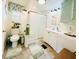 Updated bathroom with double vanity and storage at 3214 Pink Oak Ter, Sarasota, FL 34237