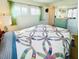 Spacious bedroom with large windows and a dresser at 3214 Pink Oak Ter, Sarasota, FL 34237