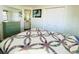 Bedroom with double doors to closet and ensuite access at 3214 Pink Oak Ter, Sarasota, FL 34237