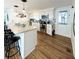 Modern kitchen with stainless steel appliances and an island at 3214 Pink Oak Ter, Sarasota, FL 34237