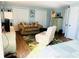 Living area with sofa and relaxing recliner at 3214 Pink Oak Ter, Sarasota, FL 34237