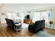 Bright and airy living room with comfortable seating at 3214 Pink Oak Ter, Sarasota, FL 34237