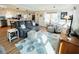 Relaxing living room with comfortable seating and hardwood floors at 3214 Pink Oak Ter, Sarasota, FL 34237