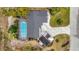 Aerial view showing home, pool, and surrounding landscape at 3219 Dawson St, Sarasota, FL 34239