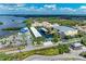 Aerial view of marina, boat slips, and parking area at 362 Pine Run Dr, Osprey, FL 34229