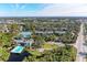 Community overview with pool, tennis courts, and pond at 362 Pine Run Dr, Osprey, FL 34229