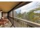 Screened balcony overlooking lush tropical landscaping at 362 Pine Run Dr, Osprey, FL 34229