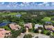 Luxury home with circular driveway and golf course views at 4022 Mayors Ct, Sarasota, FL 34240