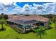 Relaxing backyard with a screened pool and lanai, offering a private outdoor retreat at 4022 Mayors Ct, Sarasota, FL 34240