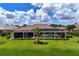 Expansive backyard with a beautiful pool and screened lanai, perfect for outdoor living at 4022 Mayors Ct, Sarasota, FL 34240