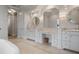 Elegant bathroom with double vanity, soaking tub, and marble floors at 4022 Mayors Ct, Sarasota, FL 34240