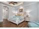 Bright primary bedroom with ensuite bathroom access at 4022 Mayors Ct, Sarasota, FL 34240
