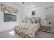 Bedroom with window seat and floral bedding at 4022 Mayors Ct, Sarasota, FL 34240