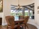 Charming breakfast nook with a view of the pool and lanai at 4022 Mayors Ct, Sarasota, FL 34240