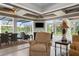 Bright Gathering room with pool and patio views at 4022 Mayors Ct, Sarasota, FL 34240
