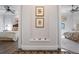 Elegant hallway with built-in shelf and access to bedrooms at 4022 Mayors Ct, Sarasota, FL 34240