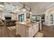 Kitchen features a large island, granite counters and stainless steel appliances at 4022 Mayors Ct, Sarasota, FL 34240