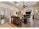 Elegant living room with hardwood floors and built-in shelving at 4022 Mayors Ct, Sarasota, FL 34240