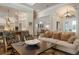 Open living area with views into kitchen and entryway at 4022 Mayors Ct, Sarasota, FL 34240