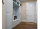 Convenient mudroom with built-in storage and bench seating at 4022 Mayors Ct, Sarasota, FL 34240