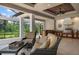 Relaxing outdoor space with comfortable seating and a view of the pool at 4022 Mayors Ct, Sarasota, FL 34240