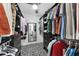 Large walk-in closet with ample shelving and hanging space at 4500 Gulf Of Mexico Dr # 305, Longboat Key, FL 34228