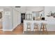 Modern kitchen with island seating and breakfast bar at 4500 Gulf Of Mexico Dr # 305, Longboat Key, FL 34228
