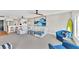 Spacious living area featuring a sectional sofa and coastal decor at 4500 Gulf Of Mexico Dr # 305, Longboat Key, FL 34228
