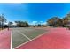 Two well-maintained tennis courts at 4522 Egmont Dr, Bradenton, FL 34203