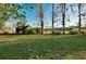 Expansive backyard with lush green grass at 4939 Myakka Valley Trl, Sarasota, FL 34241