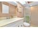 Well-lit bathroom with a modern vanity, shower, and a mirrored medicine cabinet at 4939 Myakka Valley Trl, Sarasota, FL 34241