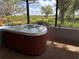 Enclosed hot tub area for relaxation with nature views at 4939 Myakka Valley Trl, Sarasota, FL 34241