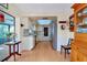 Bright kitchen features white cabinets and stainless steel appliances at 4939 Myakka Valley Trl, Sarasota, FL 34241
