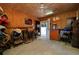 View of the tack room showcasing saddles, hats, and other equestrian accessories at 4939 Myakka Valley Trl, Sarasota, FL 34241