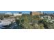 An aerial view of the property showcasing the mature trees and surrounding landscape at 505 S Orange Ave # 501, Sarasota, FL 34236