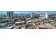 This aerial view showcases the neighborhood with its mix of high-rise buildings and charming low-rise architecture, and views of the bay at 505 S Orange Ave # 501, Sarasota, FL 34236