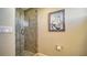Shower space featuring a glass door and neutral tile at 505 S Orange Ave # 501, Sarasota, FL 34236