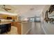 Open floor plan with kitchen, island, and eat-in space that leads into the living room at 505 S Orange Ave # 501, Sarasota, FL 34236