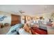 Open-concept living room and dining area with comfortable seating and stylish decor at 505 S Orange Ave # 501, Sarasota, FL 34236