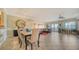 Open-concept living and dining room features natural light and tile flooring at 505 S Orange Ave # 501, Sarasota, FL 34236