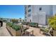 A corner view of the lounge area with a view of the pool at 505 S Orange Ave # 501, Sarasota, FL 34236