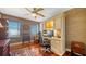 Office space featuring built-in desk and storage with hardwood floors at 505 S Orange Ave # 501, Sarasota, FL 34236