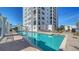 A long view of the community pool situated beside the tower at 505 S Orange Ave # 501, Sarasota, FL 34236