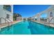 Relaxing swimming pool is surrounded by archways and a beautiful deck for sunbathing at 505 S Orange Ave # 501, Sarasota, FL 34236